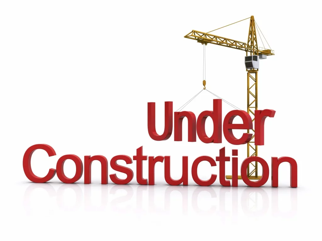 Auf den Bild ist ein Kran zu erkennen der das Wort "Under Construction" zusammen baut. Dieses Bild illustriert eines der aitimatic Projekten bei dem eine Technologie Migration durchgeführt wurde.